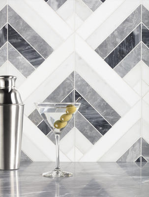 Named for one of the great resorts of the Art Deco era, Arrowhead’s right-angled stripes of marble combine in a surging energy. 