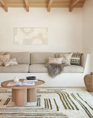 Earth Maze Moroccan Shag Rug and Pillows by Élan Byrd styled with the Delta Round Coffee Table