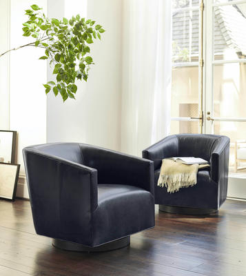 Cooper Swivel chairs in Mont Blanc Blue Smoke Leather