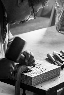 Master artisan Ciro Dorado at work in the workshop in La Chiquitania, Bolivia.