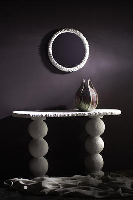 The Clam Shell mirror and Selina console table.