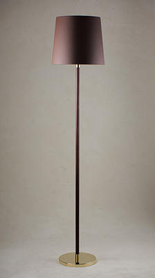 The Huxley floor lamp comes as a sister piece to the Huxley table lamp. The leather used on the Huxley is produced using plant-based materials and environmentally conscious techniques. The Huxley comes in Chocolate Leather with a Brass or Antiqued Brass base.
