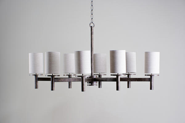 The ever-popular Neptune chandelier is now available in a smaller size. Still with its simple character very much intact, the Small Neptune is formed of a framework of linear struts and works perfectly in smaller areas with limited headroom. 