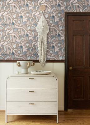 Mosaic wallpaper by Malene Barnett styled with the Brooke three-drawer dresser and Arteriors Clyde centerpiece