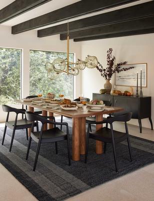Adentro rug styled with the Throop dining table, Ida dining arm chair, and Backstreet chandelier.
