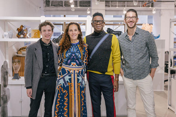 Galerie managing editor JIll Sieracki (second from left) with the Apartment 48 design team, led by Rayman Boozer (second from right) in the Daum & Haviland showroom