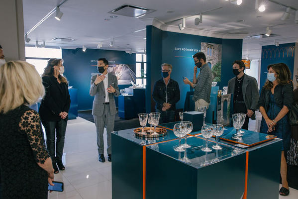 Fiskars Group retail marketing manager Douglas Yuen and Michelle Westcott-Richards, director of public relations and special events and head of public relations and partnerships, lead a tour through the Waterford Lismore collection on Designer Day.