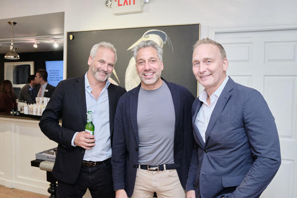 Thom Filicia (center) with Dan Weiss and John Weiss of Lillian August