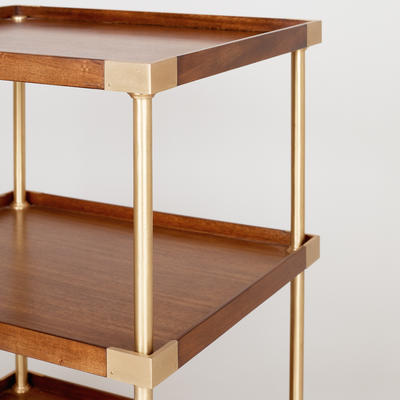 Upham Etagere large - Comprised of three tiers, this rectangular étagère takes its inspiration from a 1950s design. A satisfying combination of wood and brass, it has a sophisticated, modern feel to it.