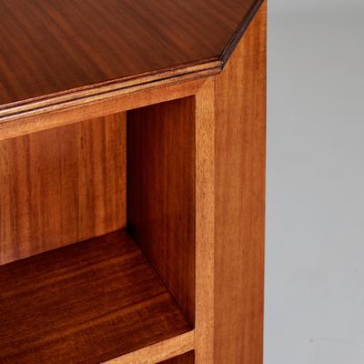 Thackham Bookcase detail - The octagonal form of the table lends itself to the design of a bookcase.  