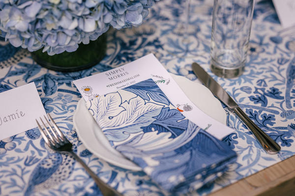 The Acanthus napkin serves as the setting for a family-style menu.