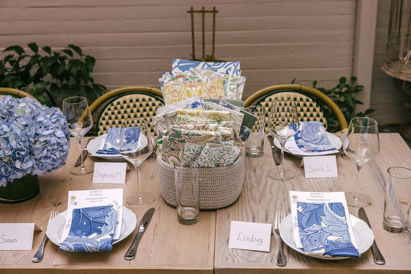 Tables were adorned with Acanthus napkins and baskets of samples for guests to explore.