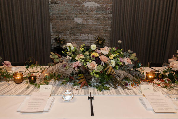 The tables were decorated with a custom table runner in Victoria Hagan’s Tidal Line material in Slate.