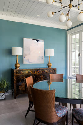 Eric Blum painting in an elegant dining room