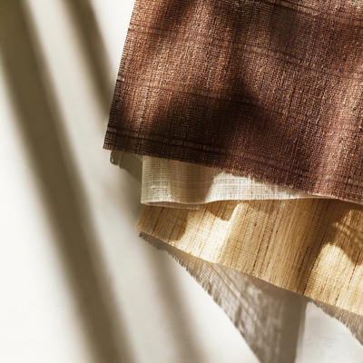 Laguna: Made with tightly woven natural fibers, this picturesque textile adds beach bungalow-inspired atmosphere to your favorite interiors.