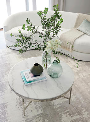 Giselle sofa, Vienna table and Tides vases