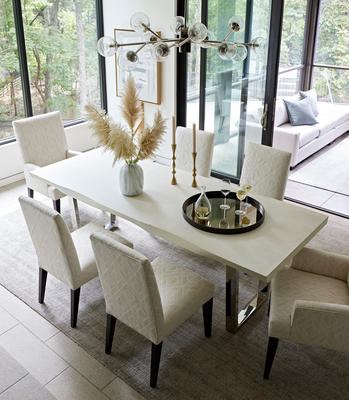 Anthony dining chairs in Bawtry fabric in Oyster by Kravet and Kimora dining table in matte white