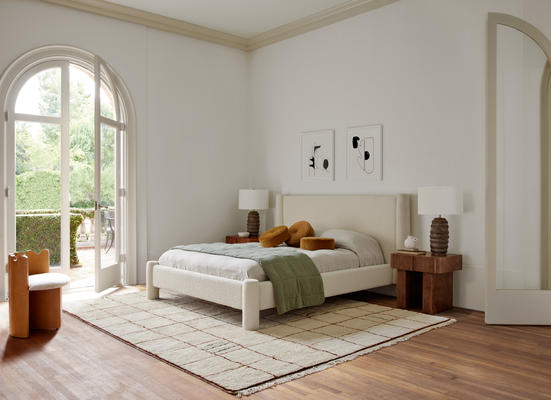 They Hyvva bed, Irregular Grid rug, Merrit nightstand, Velvet Disc pillow, and Regina Andrew Ola ceramic table lamp.