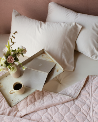 Bria Pillowcases and Bria fitted sheet in Parchment with Harlow coverlet in Pearl. 