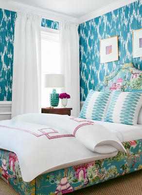 Maverick wallpaper in teal, bed upholstered in Mystic Garden, pillows in Nola Stripe Embroidery