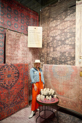 Kate Lester in front of items from her very own Harman collection with Jaipur Living