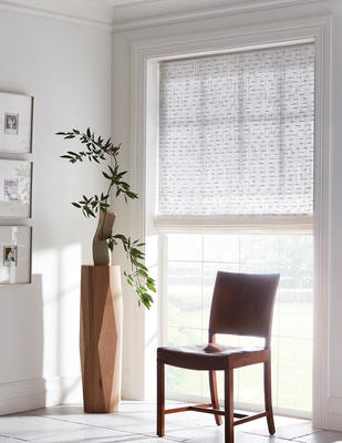 Dapple woven-to-size grassweave window covering

True to its namesake, Dapple evokes the dreamy look of sunlight peeking through leaves on a tree. The gauzy ground of handwoven ramie plays host to a freeform grid of ramie slubs. The raised textural design softly filters the light and lends relaxed refinement to an interior.