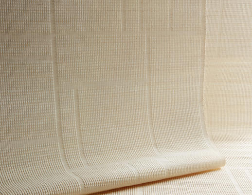 Framework woven-to-size grassweave window covering

The large repeating windowpane motif is inspired by the chogak bo, or patchwork, style of Korean bojagi. Masterfully jacquard-handloomed of banana fiber, the textural geometry brings dimension and differing opacities to the quiet, monochromatic composition.