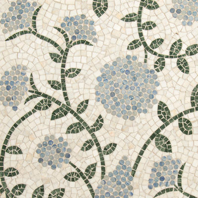 Amaranth, a hand-cut mosaic shown in tumbled Cloud Nine, polished Blue Macauba and Spring Green, is part of the Biome collection by New Ravenna.