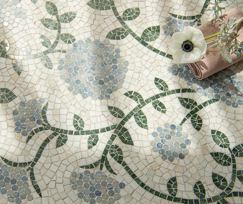 Amaranth, a hand-cut mosaic shown in tumbled Cloud Nine, polished Blue Macauba and Spring Green, is part of the Biome collection by New Ravenna.