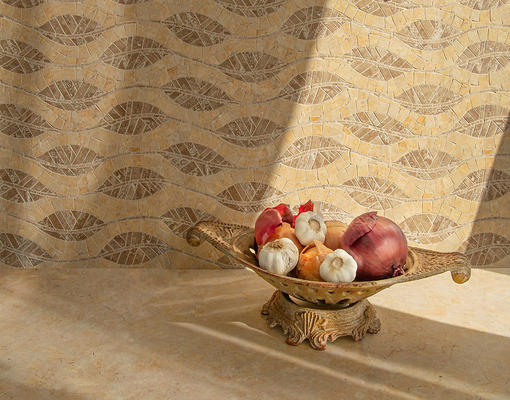 Cocoon, a hand-cut mosaic shown in honed Jerusalem Gold, Lavigne and Travertine Noce, is part of the Biome collection by New Ravenna.