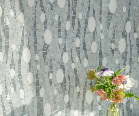 Current, a hand-cut and waterjet mosaic shown in polished Celeste, Carrara, Allure and Thassos, is part of the Biome collection for New Ravenna.