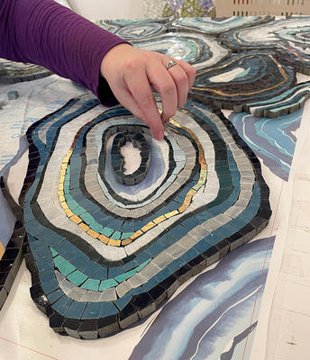Geode, a hand-cut stone mosaic shown in honed Thassos, polished Indigo, Orchid, Cornflower, Hydrangea, Aloe, Lotus, Periwinkle, Celeste, Carrara, Blue Macauba and Aurum, is part of the Biome collection for New Ravenna.