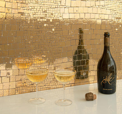 Reptile, a hand-chopped mosaic shown in polished Aurum, is part of the Biome collection by New Ravenna.