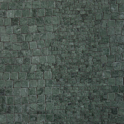 Reptile, a hand-chopped mosaic shown in tumbled Verde Alpi, is part of the Biome collection by New Ravenna.