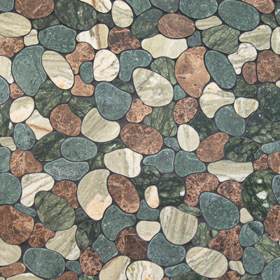 Riverbed, a waterjet mosaic shown in honed Verde Luna, Chartreuse, Emperador Dark and tumbled Spring Green, is part of the Biome collection by New Ravenna.