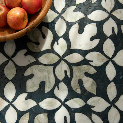 Sassafras, a hand-cut and waterjet mosaic shown in polished Orchid and Alba Chiara, is part of the Biome collection by New Ravenna.