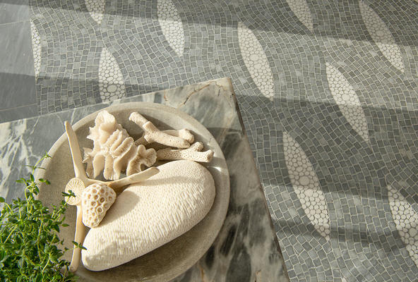 Stingray, a hand-chopped and waterjet mosaic shown in tumbled Allure and Thassos, is part of the Biome collection by New Ravenna.