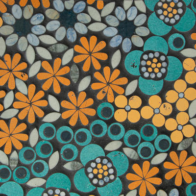 Wildflowers, a waterjet mosaic shown in polished Blue Macauba, Orchid, Aloe, Goldenrod, Tiger Lily and Kay’s Green, is part of the Biome collection by New Ravenna.