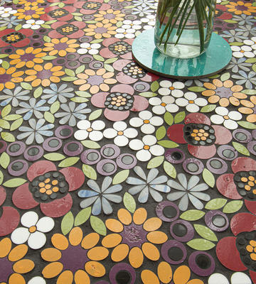 Wildflowers, a waterjet mosaic shown in polished Blue Macauba, Goldenrod, Iris, Thassos, Nero Marquina, Sweetgrass and Zinnia, is part of the Biome collection by New Ravenna.