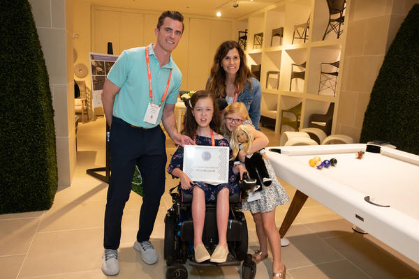 The Bloomfield family, Matthew, Sara and Emily, with design competition champion Olivia 
