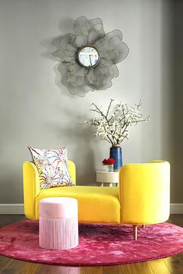 Right Meets Left Interior Design founder Courtney McLeod specified Ultrasuede HP fabric in Sunshine for this bright and happy tête-à-tête.