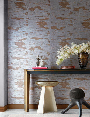 Inspired by the bark, the Birch natural wallcovering series reinterprets its namesake in a richly textural design. The large-scale dimensional pattern is elaborately stitched with slate or gold threads that offer a delicate counterpoint to a rough-hewn cork ground over metallic paper. Available in two colorways.