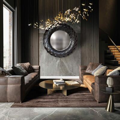 Grand in size, the leather Mamba mirror is the newest introduction from Clarisse Design, based in Durban, South Africa. Each layer of embossed leather creates a leaflike shape. 