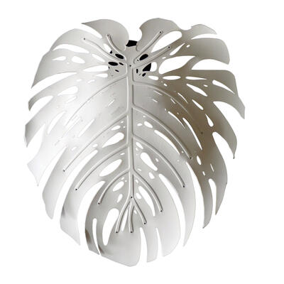 The Delicious wall sconce, shown here in white, is named after the Philodendron Monstera plant found throughout the coastal regions of southern Africa.