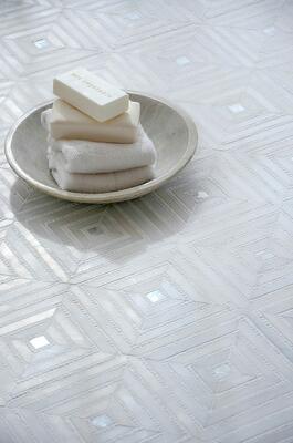 Bryce, in honed Paperwhite, tumbled Thassos and Shell, from the Studio Line by New Ravenna.