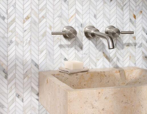 Chevron in polished Calacatta Gold from the Studio Line by New Ravenna.