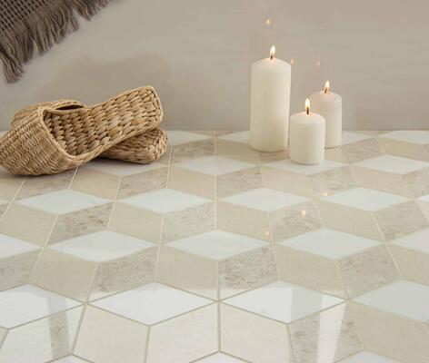 Euclid Grand, a hand-cut mosaic shown in polished Ivory Cream, Dolomite and Botticino, is part of the Studio Line collection by New Ravenna.