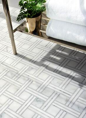 Jennifer, a hand-cut mosaic in polished Calacatta, Thassos and Carrara, is part of the Studio Line by New Ravenna.
