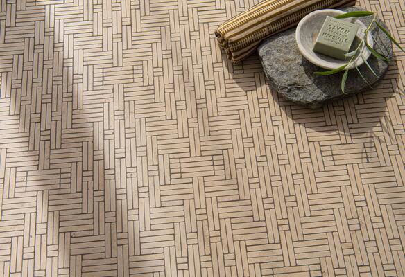 Jute, in tumbled Lagos Gold, is a hand-cut mosaic from the Studio Line by New Ravenna.