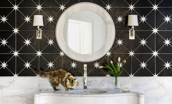 Orion, a water-jet stone mosaic in honed Nero Marquina and polished Dolomite, is part of the Studio Line of ready-to-ship mosaics by New Ravenna.